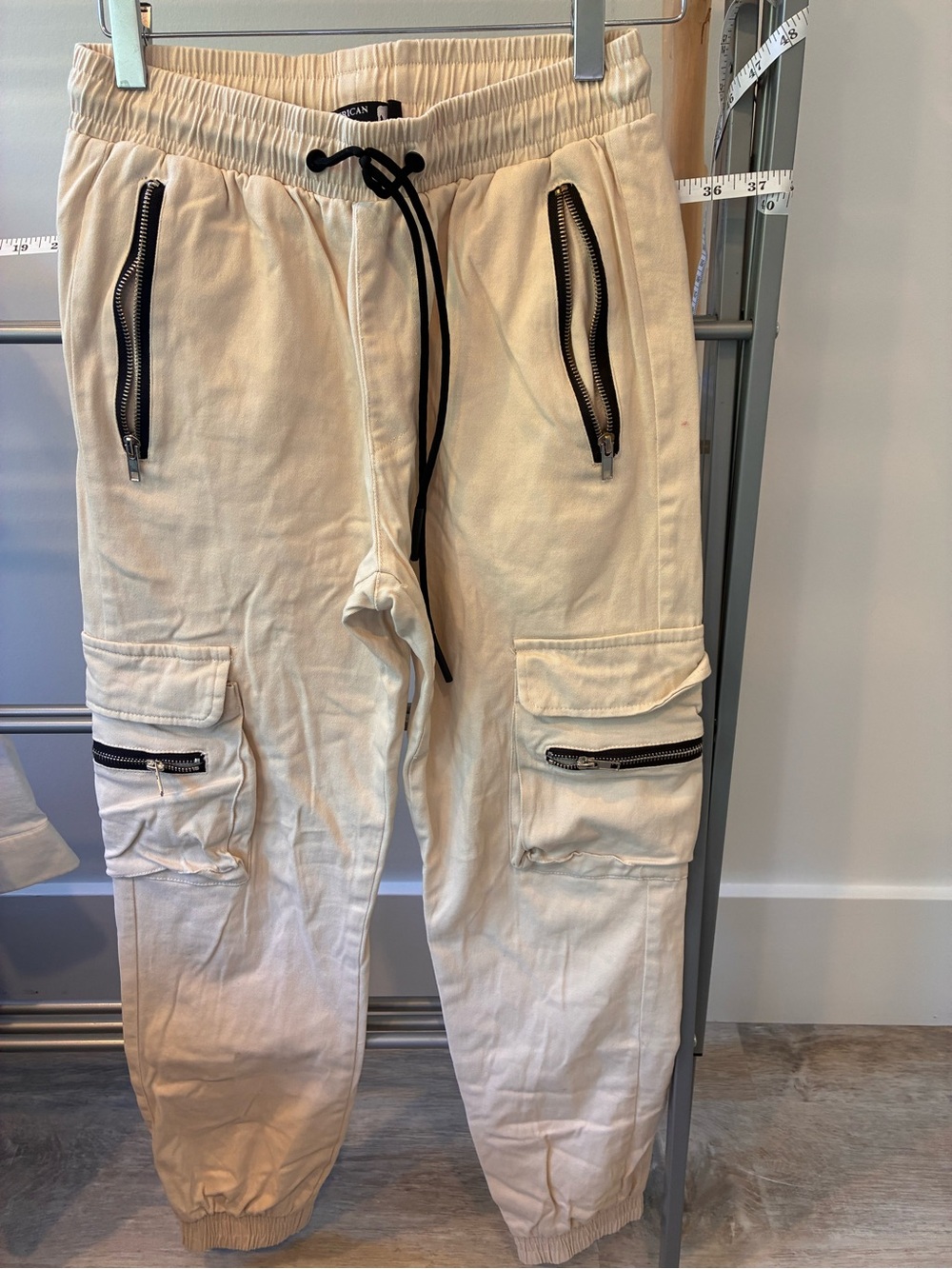 Cream Cargo Jogger Pants with Black Zip Accents